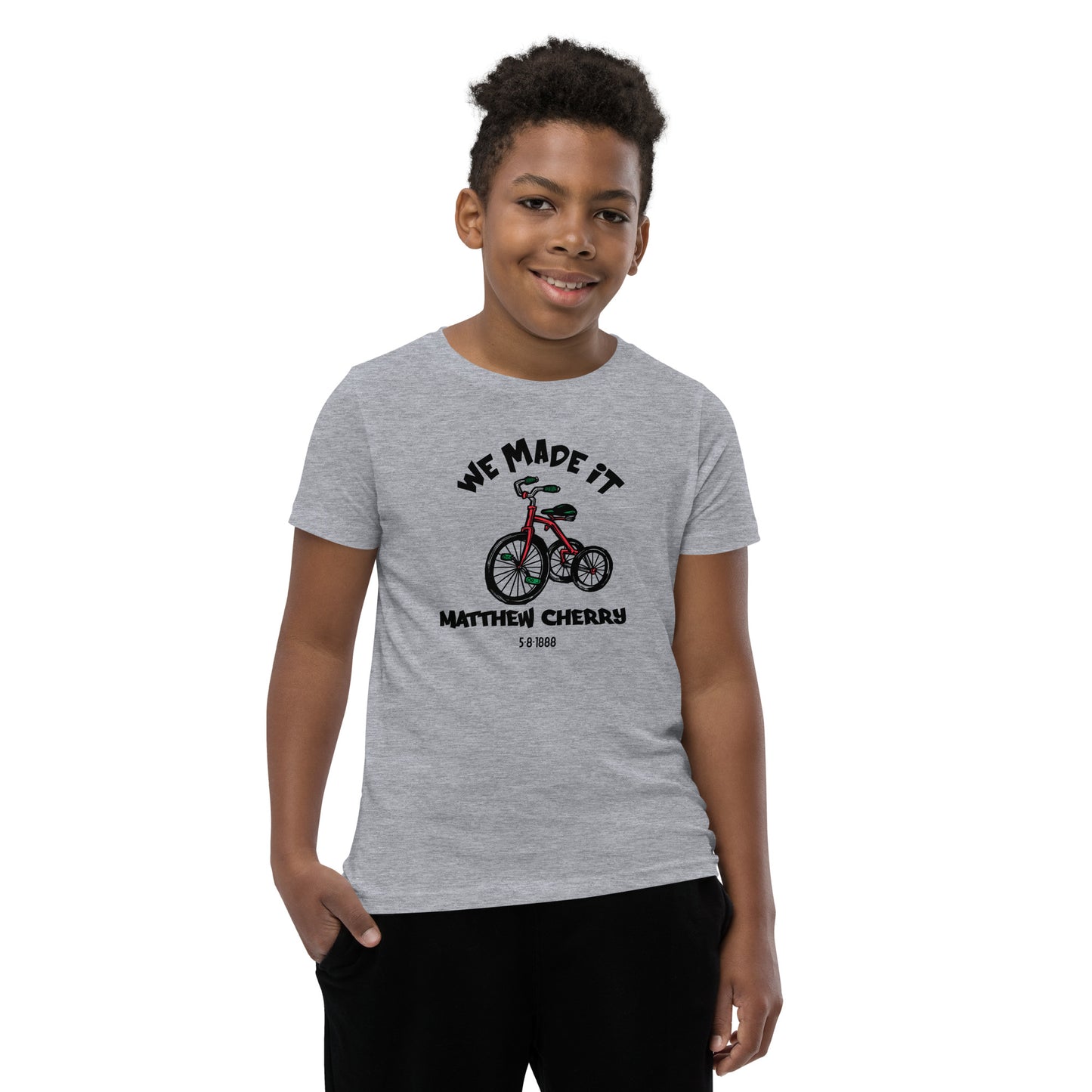 We Made It, Youth T-Shirt | Pedal the Path Matthew Cherry Tricycle Patent T-Shirt